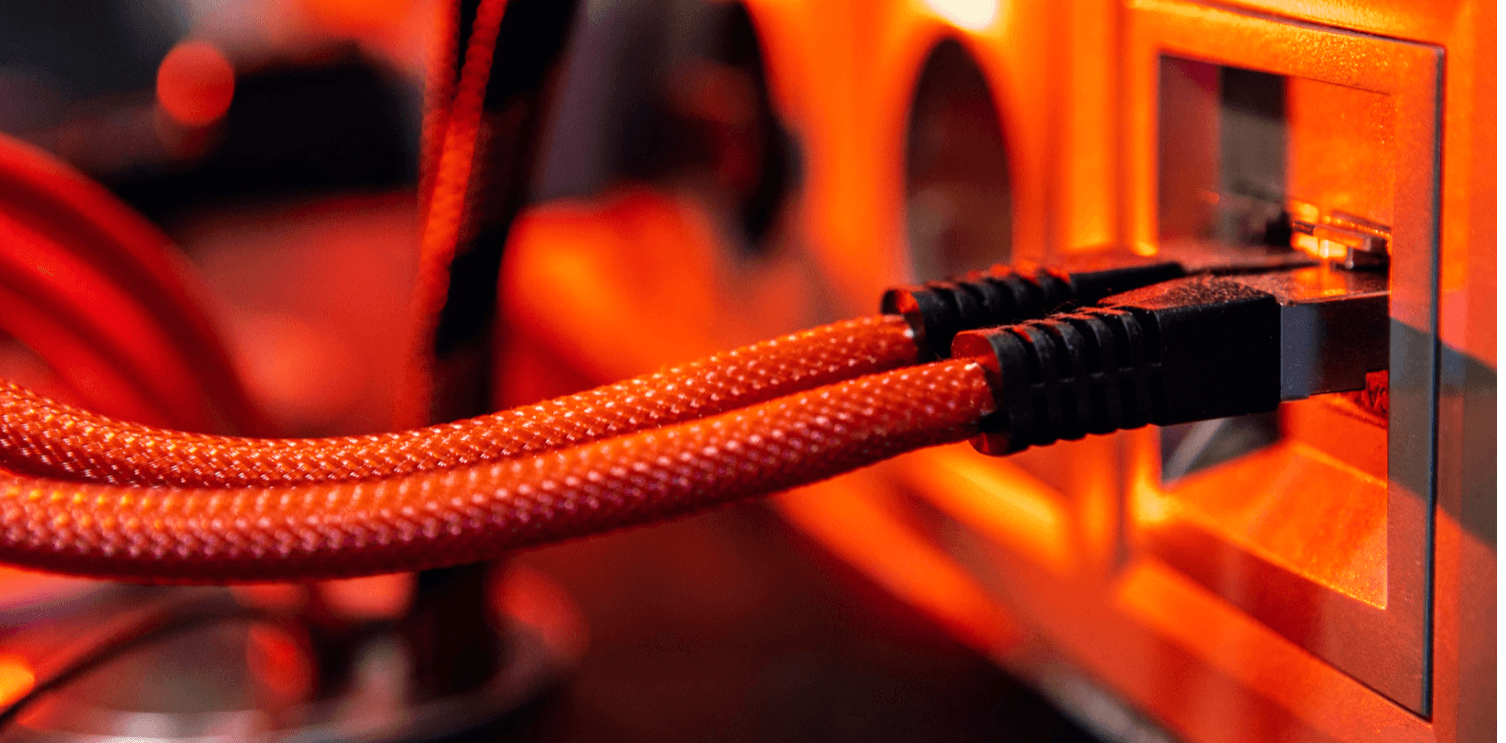 Network cables plugged into enterprise switching hardware