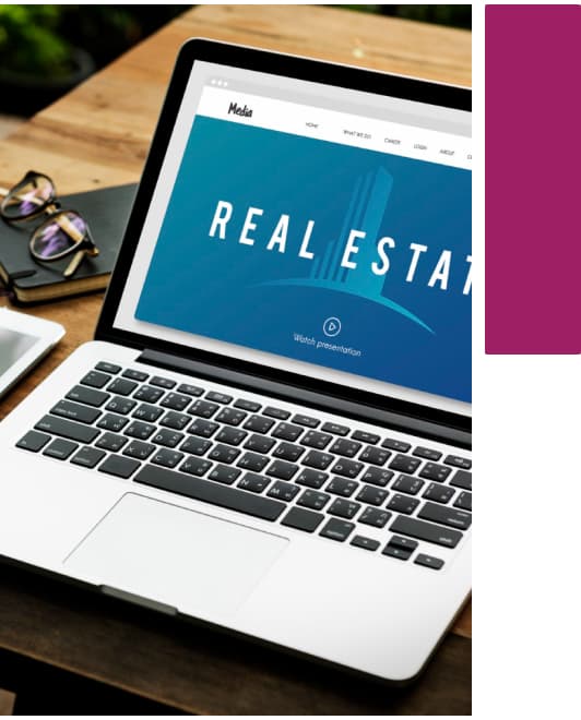 Laptop displaying a real estate management platform